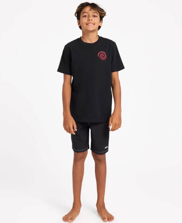Quiksilver Tai Kehu Tai-Uru Youth Maori T-Shirt in black on model in Maori boardshorts from the front