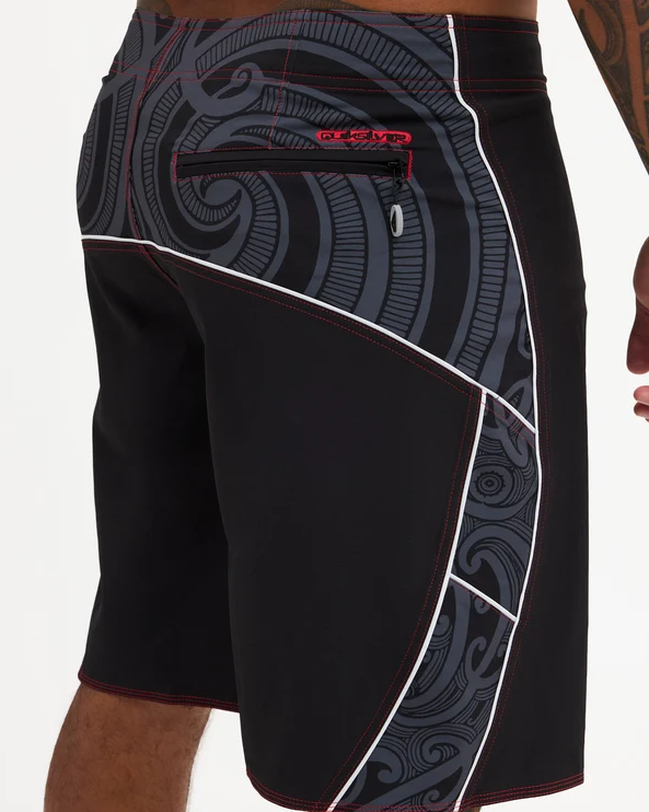 Quiksilver Tai Kehu Takarangi 21" Maori Boardshorts in black, white and red on Kehu Butler from the back close up
