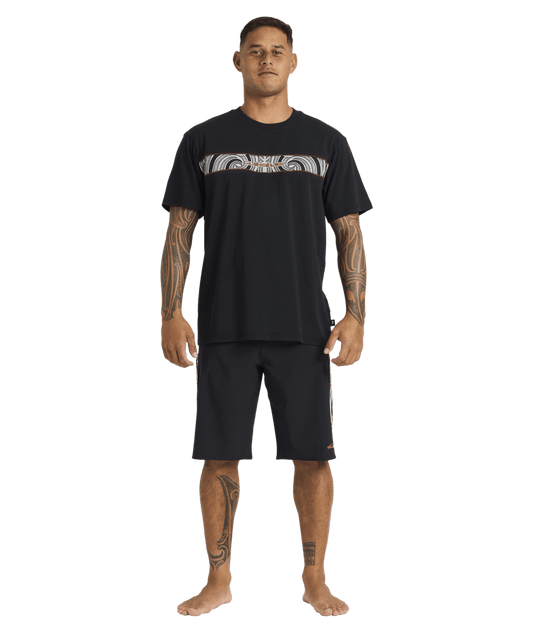 Quiksilver Tai Kehu Takarangi Panel T-Shirt in black on Kehu Butler full length in Maori boardshorts