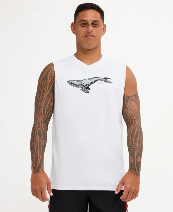 Quiksilver Tai Kehu Tohora Muscle in white with a whale on it on Kehu Butler wearing Quiksilver Maori boardshorts