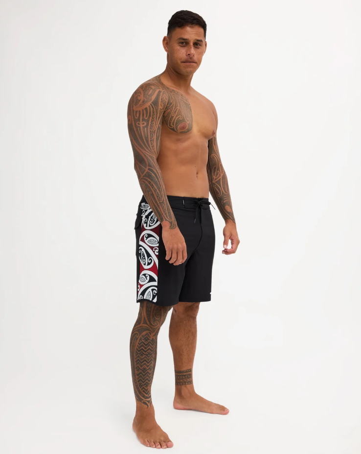 Quiksilver Tai Kehu Tohu Surfsilk 18" Boardshorts on Kehu Butler from the front on a side angle