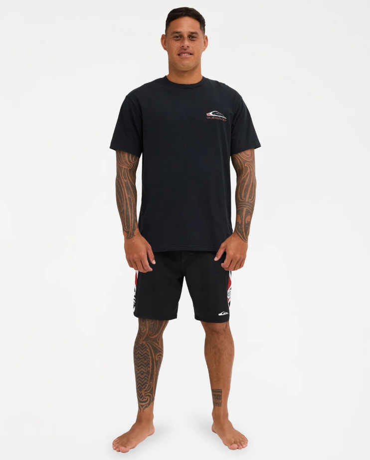 Quiksilver Tai Kehu Tohu Maori T-Shirt in black on Kehu Butler in Maori boardshortsa from the front