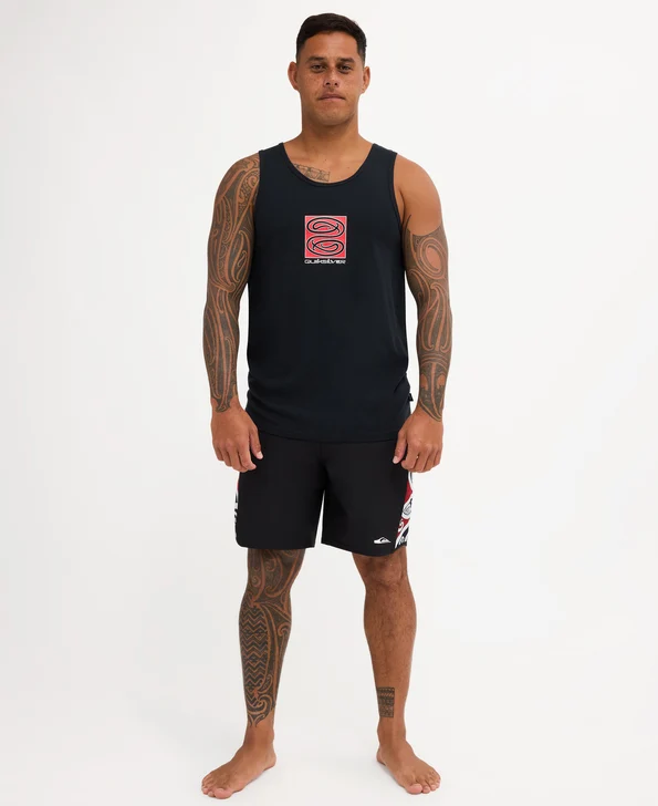 Quiksilver Tai Kehu Tuna Heke Tank in black on Kehu Butler wearing Maori boardshorts from the front