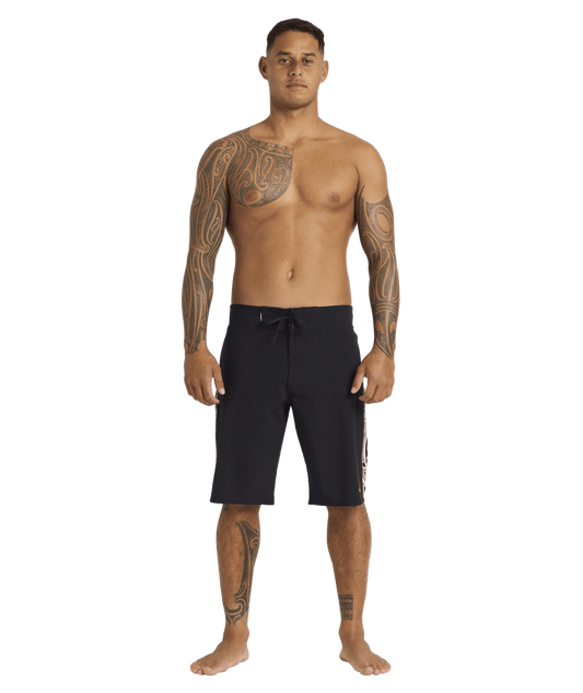 Quiksilver Tai Kehu Takarangi 20" Boardshorts in black with puhoro design from front full length on kehu butler