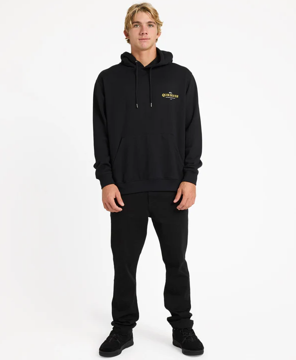 Quiksilver Swordfish Pullover Hoodie in black from front full length on guy in black jeans and boots