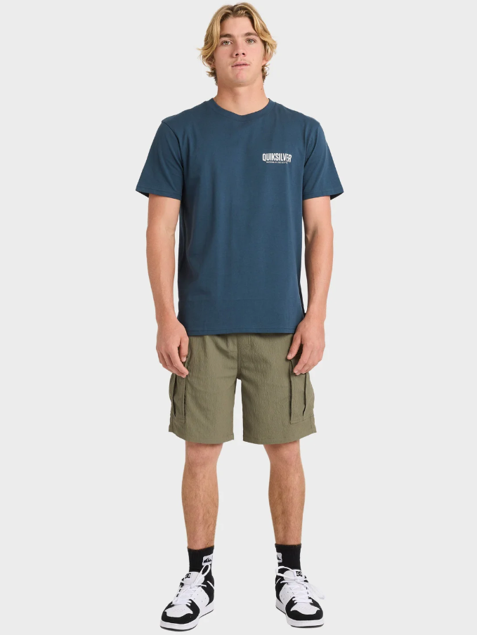 Quiksilver Watermans Cargo Shorts in olive on model in blue Quiksilver tee