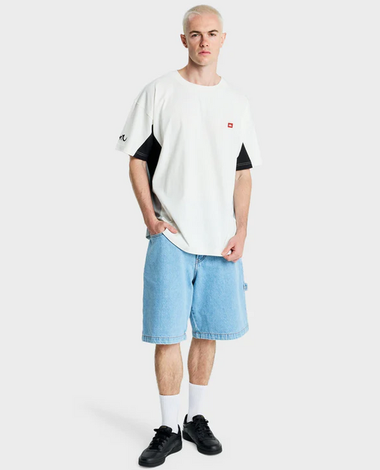 Quiksilver YG Flux Men's T-Shirt in snow white on model in blue jorts from front