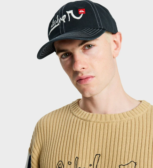 Quiiksilver Young Guns Drifter 6 Panel Cap in black on model in beige knit top