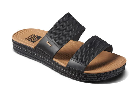 Reef Water Vista Womens Slides  in black and tan from the side