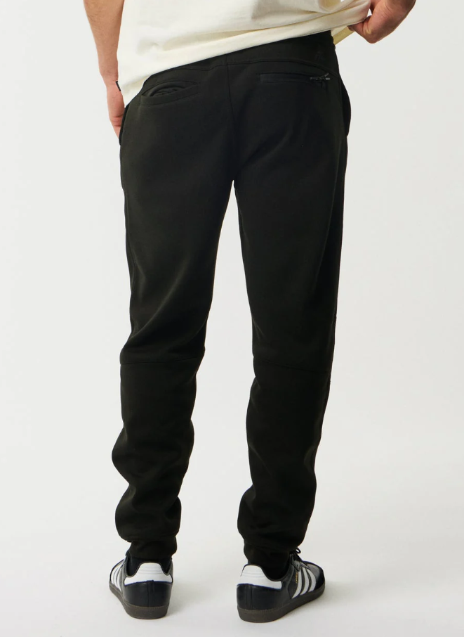 Rip Curl Anti Series Departed DWR Bonded Fleece Trackpant in black from rear