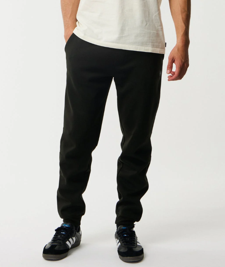 Rip Curl Anti Series Departed DWR Bonded Fleece Trackpant in black from front