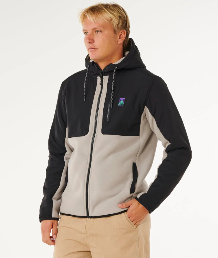 Rip Curl Anti-Series Paneled Z-Thru Hoodie in black and stone colourway on model from side