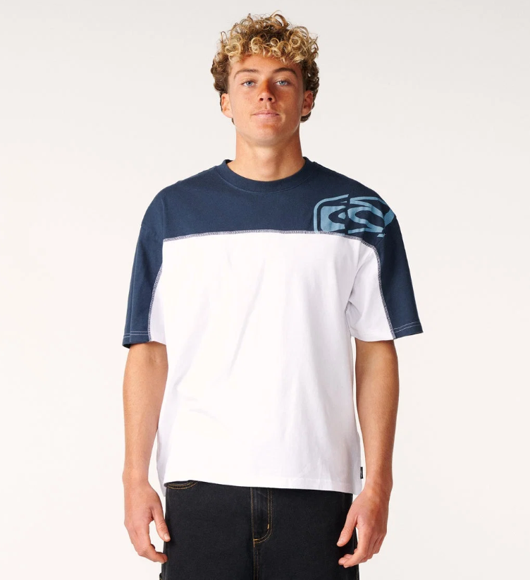 Rip Curl Archive Thrashed Panel Men's T-Shirt in white with blue shoulder panel on model from the front close up