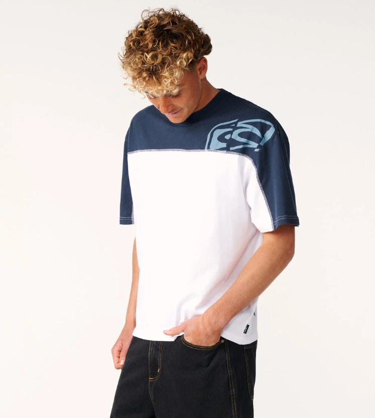 Rip Curl Archive Thrashed Panel Men's T-Shirt in white with blue shoulder panel on model from the front on an angle close up
