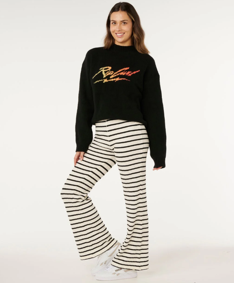 Rip Curl Women's Bobbi Stripe Pants in black and white stripes on women in black rip curl knit