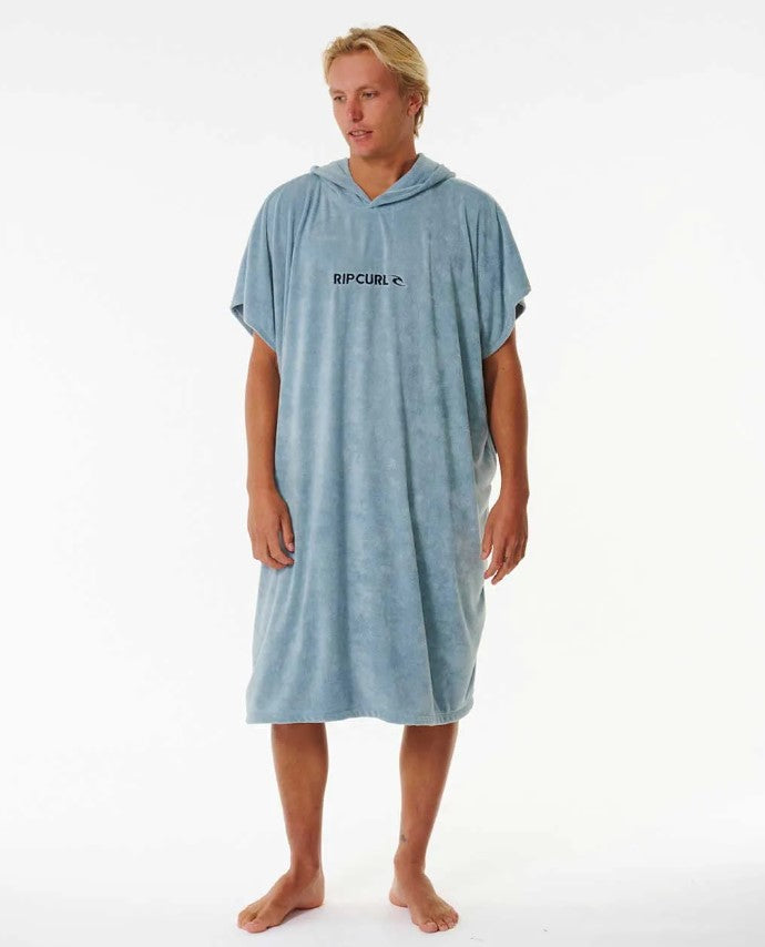 Korbin Hutchings wearing a Rip Curl Brand Hooded Towel in dusty blue colour