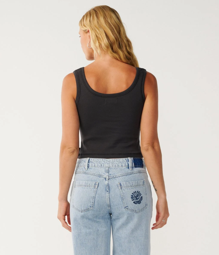 Rip Curl Classic Ribbed Women's Tank in washed black colour on model n blue jeans from the rear