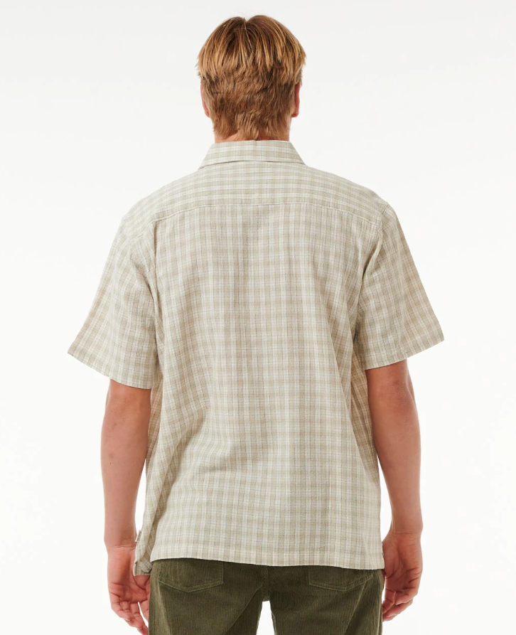 Rip Curl Classic Surf Check Short Sleeve Shirt in bone colourway on model in olive coloured trousers from the back