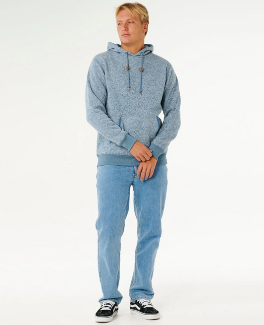 Rip Curl Classic Surf Crescent Hoodie in bluefin on model in blue jeans from front
