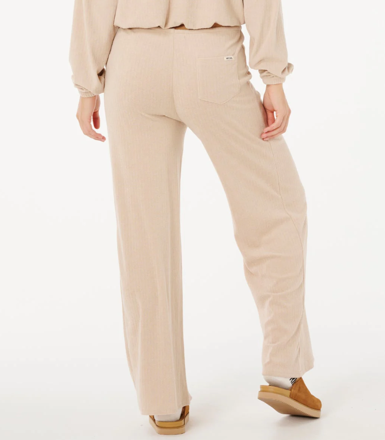 Rip Curl Cosy Cord Wide Leg Women's Pants in natural colourway on model from rear close up