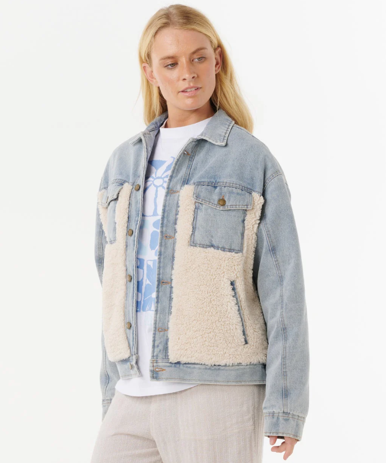 Rip Curl Cruisin' Sherpa Denim Jacket in washed blue with sherpa detailing on model from side