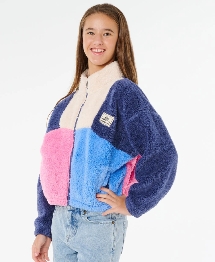 Rip Curl Girl's Block Party Polar Fleece in navy multi colour on girl model from side
