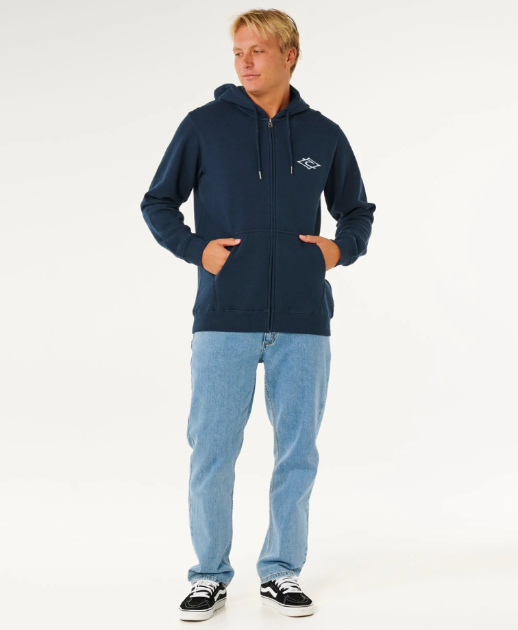 Rip Curl Hazey Days Zip Thru Hoodie in dark navy from front on Korbin Hutchings in light blue denim jeans