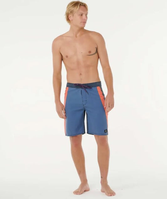 Rip Curl Mirage Giant Prawn 20" Boardshorts in blue, red and black on Korbin Hutchings