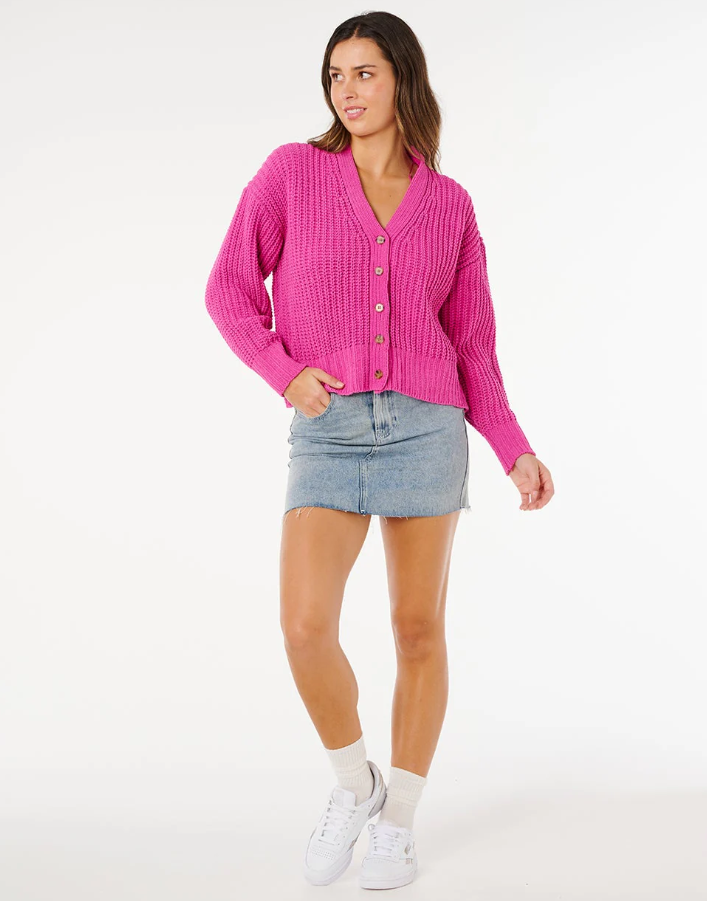 Rip Curl Neon Isles Women's Knit Cardigan in light pink on model in denim skirt