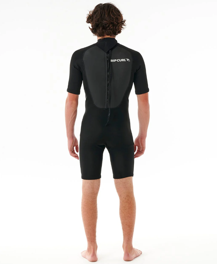 Rip Curl Omega 2mm Mens Spring Wetsuit in black on model from rear