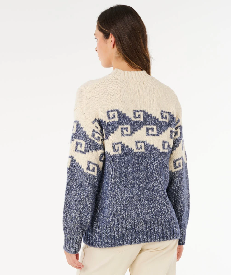 Rip Curl Pacific Coast Knit Sweater in blue and beige colourway on model in beige pants from rear