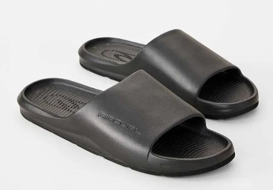 Rip Curl Pill Bloom Mens Slides in black showing pair from the side