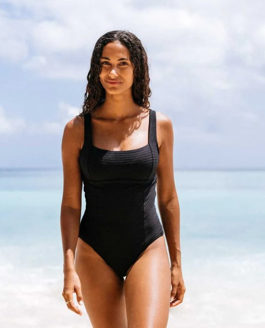 Rip Curl Premium Surf D/DD Onepiece Swimwear  in black on dark-haired model at the beach