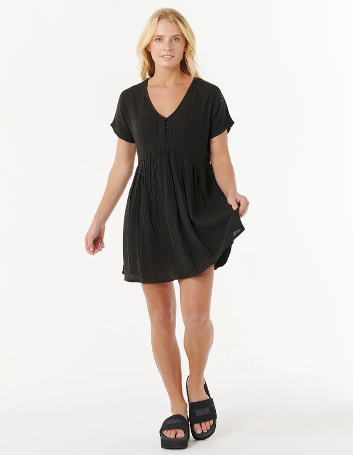 Rip Curl Premium Surf Short Sleeve Dress in black on model from the front full length