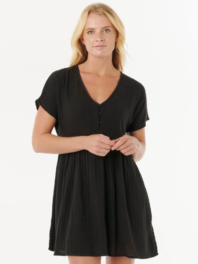 Rip Curl Premium Surf Short Sleeve Dress in black on model from the front