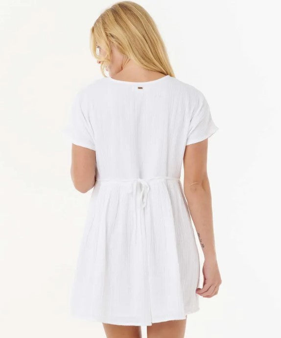 Rip Curl Premium Surf Short Sleeve Dress in white on blonde model from the ear