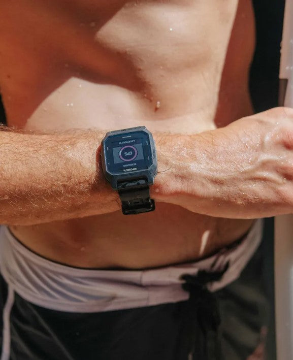 Rip Curl Search GPS 3 Watch in midnight on surfers wrist