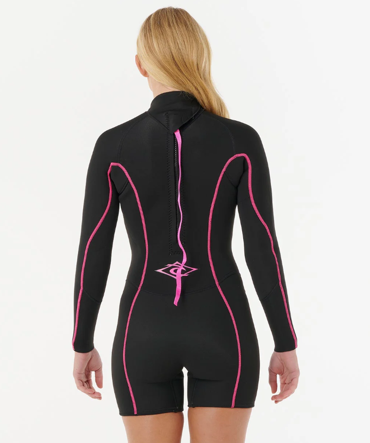 Rip Curl SG Dawn Patrol Back Zip Long Sleeve Womens Wetsuit in black with pink detailing on model from  rear
