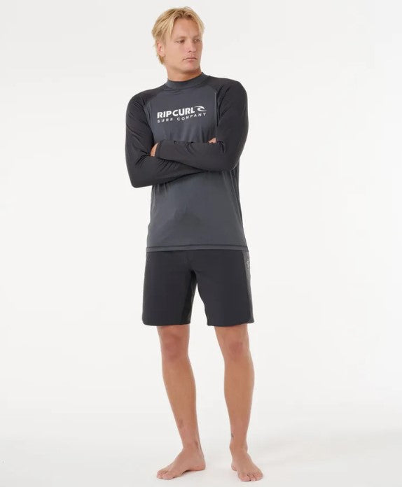 Rip Curl Shock UPF Long Sleeve Mens Rash Top in charcoal body with black marle arms on model from front