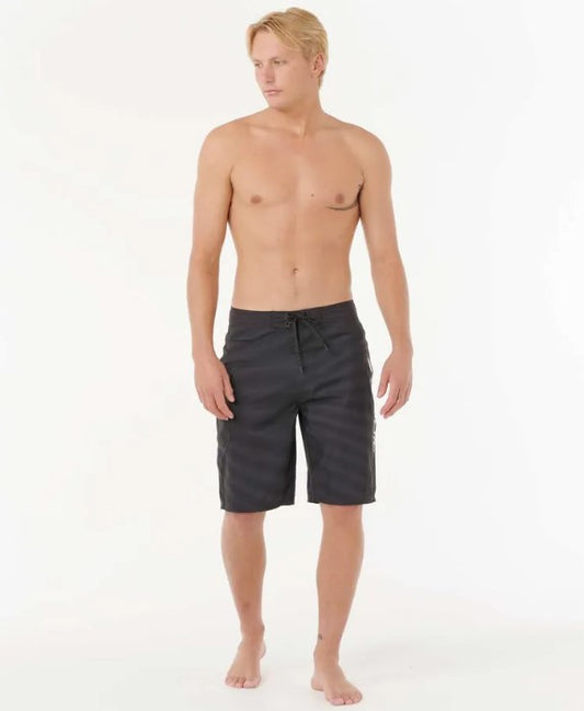 Rip Curl Shock Wave 21" Boardshorts in black with slight fade through them on Korbin Hutchings