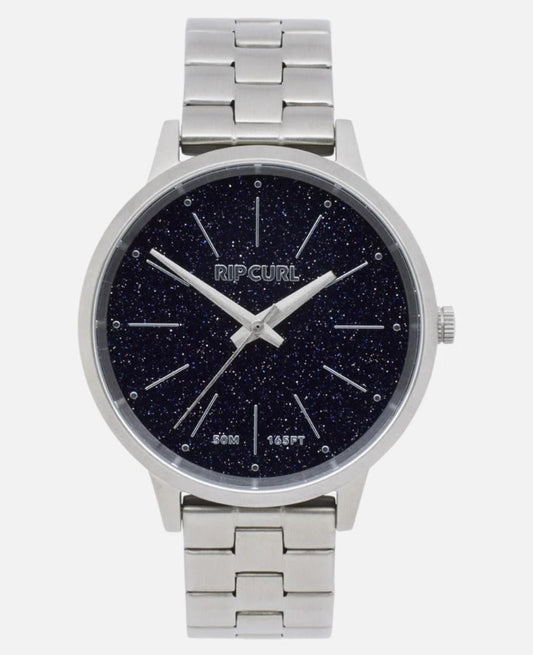 Shop the Rip Curl Lola Slim Stonework Stainless Steel Womens Watch in silver with blue rhinestone face