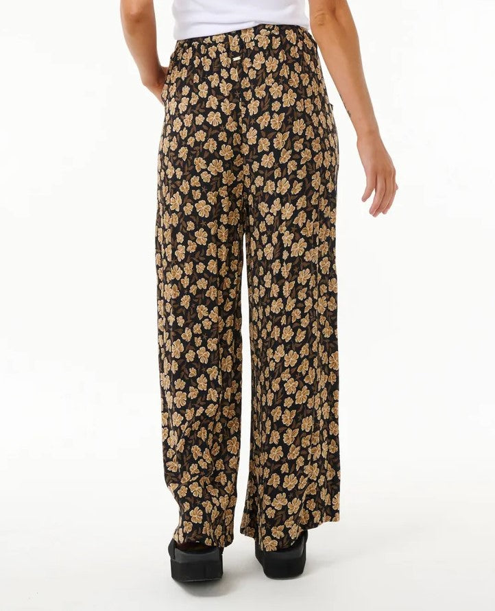 Rip Curl Soleil Pants in black with floral detail from rear