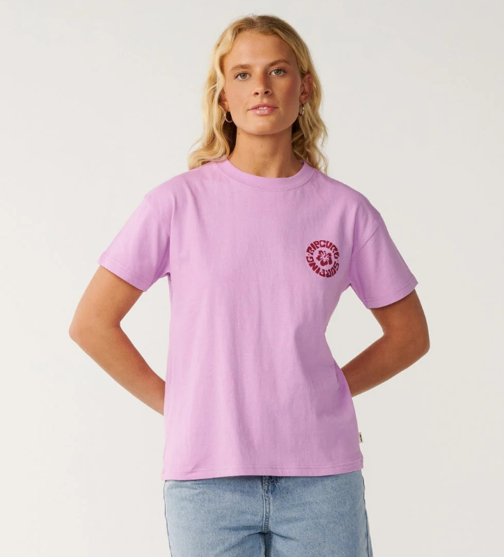 Rip Curl Surf Puff Party Relaxed Tee in bright lilac colourway on blonde model from the front