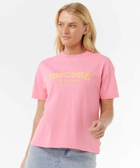 Rip Curl Surf Puff Relaxed Womens T-shirt in pink with orange puff print on the fron worn by a light-haired model