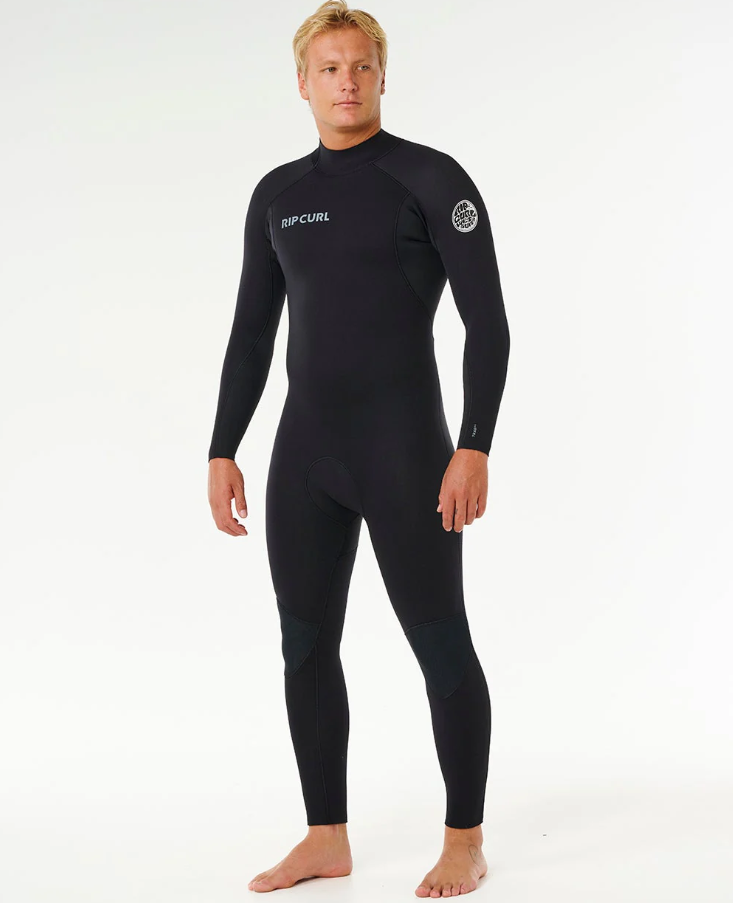 Rip Curl Traditional 4/3mm Back Zip GBS Wetsuit in black on model from front/side view