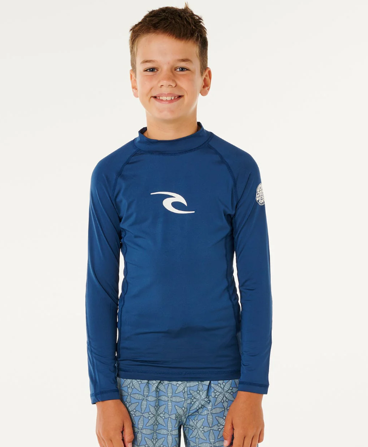 Rip Curl Boys Waves UPF Long Sleeve Rash Top in light navy on young model from front
