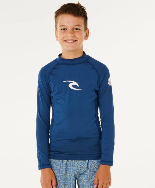 Rip Curl Boys Waves UPF Long Sleeve Rash Top in light navy on young model from front