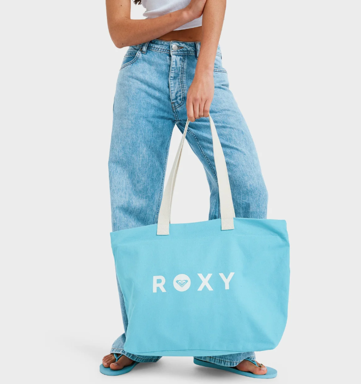 Roxy Cool Summer Tote Bag
 in coastal shade blue colourway held by model