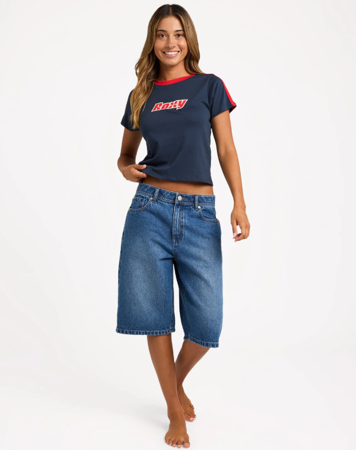 Roxy Game Time Baby Tee in navy with red detail on model from front
