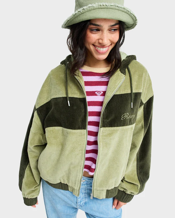 Roxy Have A Blast Womens Cord Jacket
  in oil green on model in blue jeans and pink striped Roxy tee from front